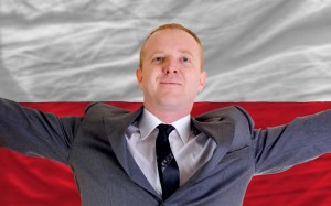 happy businessman because of profitable investment in poland sta