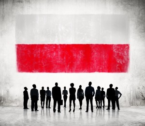 Silhouettes of People and a Flag of Poland